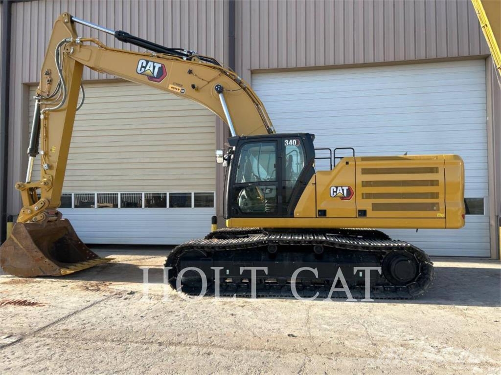 CAT 340 12 TC Chargeuse sur pneus