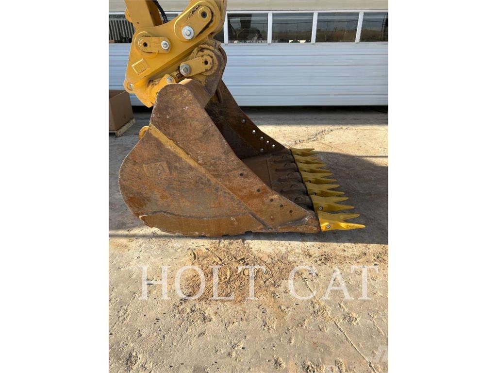 CAT 340 12 TC Chargeuse sur pneus