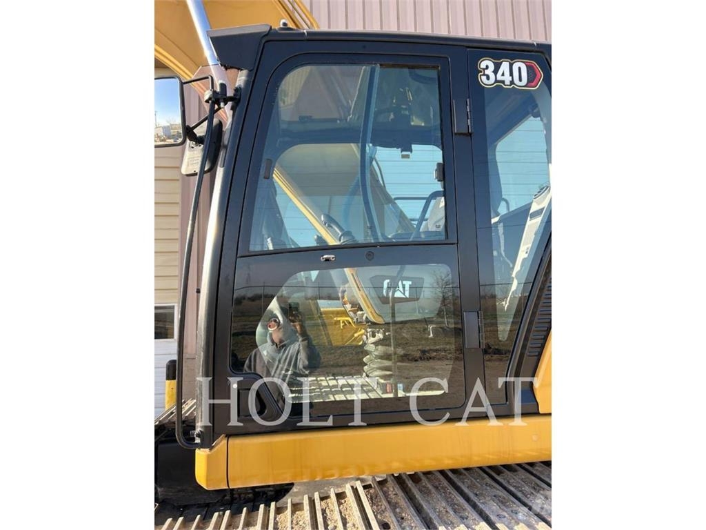 CAT 340 12 TC Chargeuse sur pneus