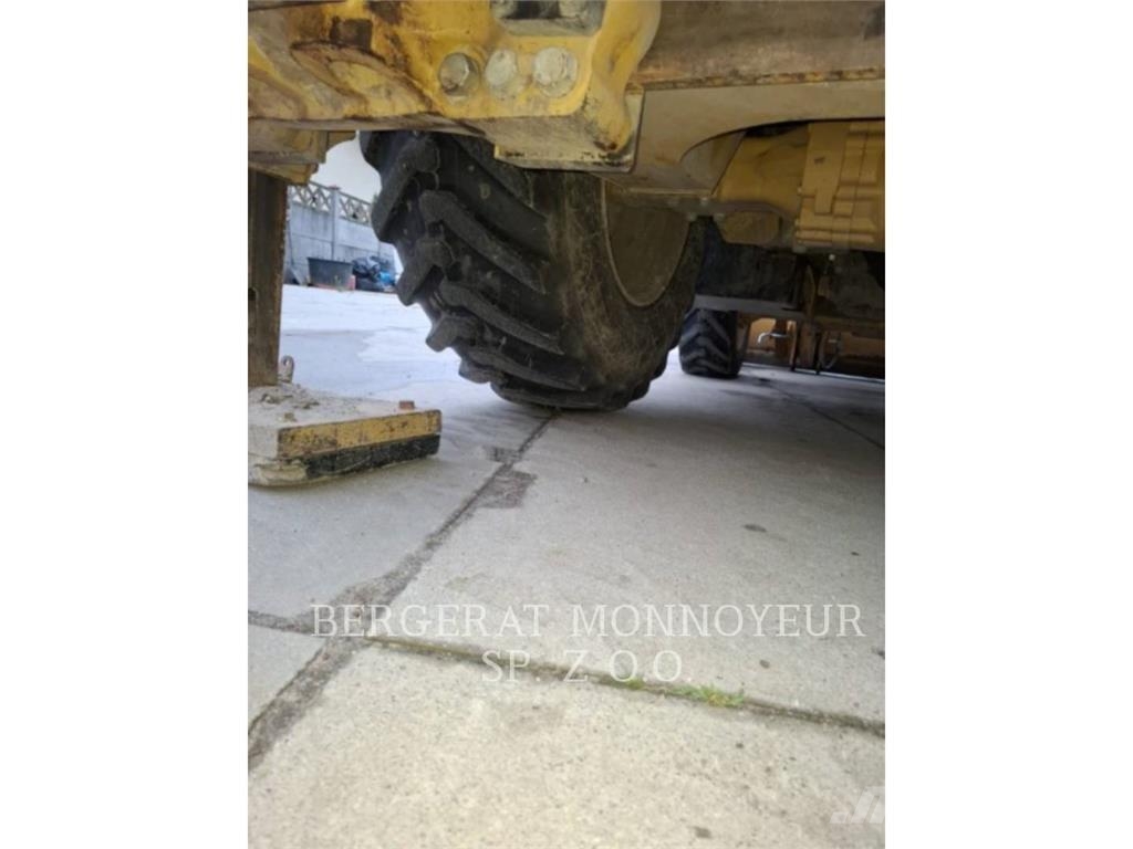 CAT 428-07 Екскаватори-навантажувачі