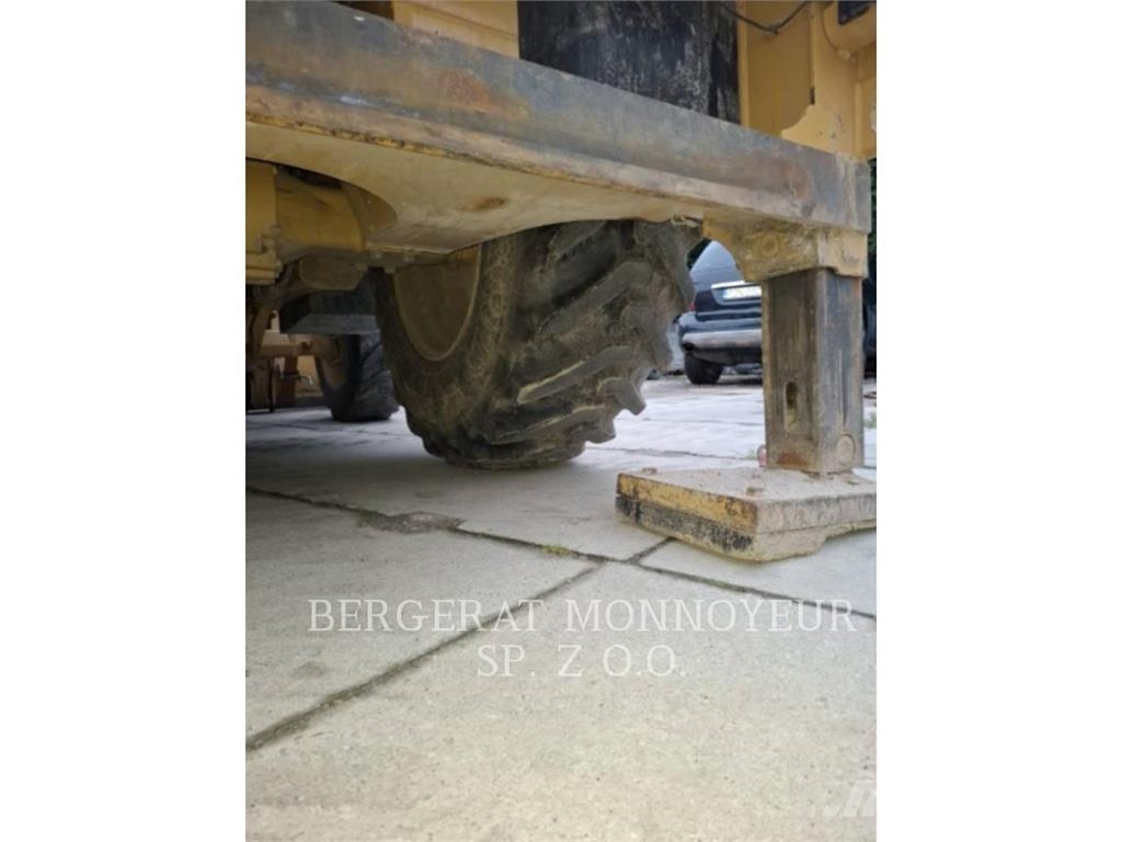 CAT 428-07 Екскаватори-навантажувачі
