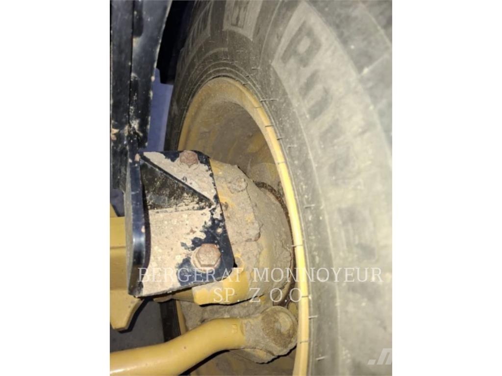 CAT 428-07 Екскаватори-навантажувачі