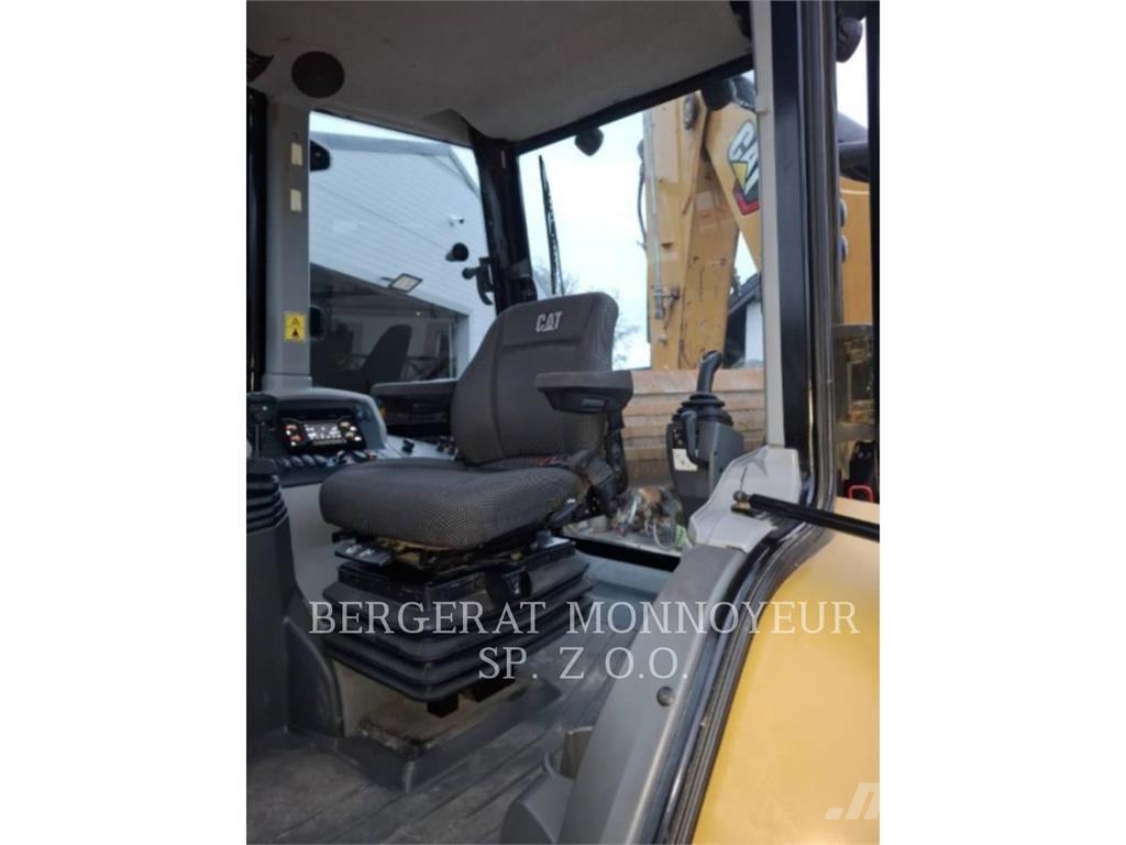 CAT 428-07 Екскаватори-навантажувачі
