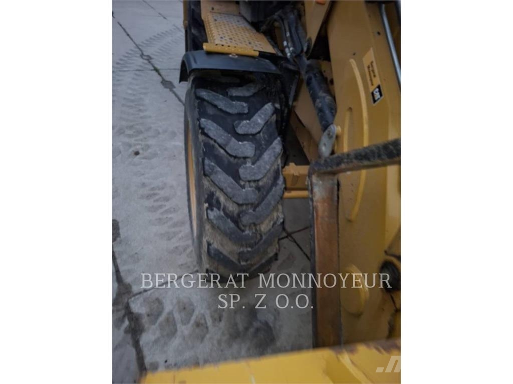 CAT 428-07 Екскаватори-навантажувачі
