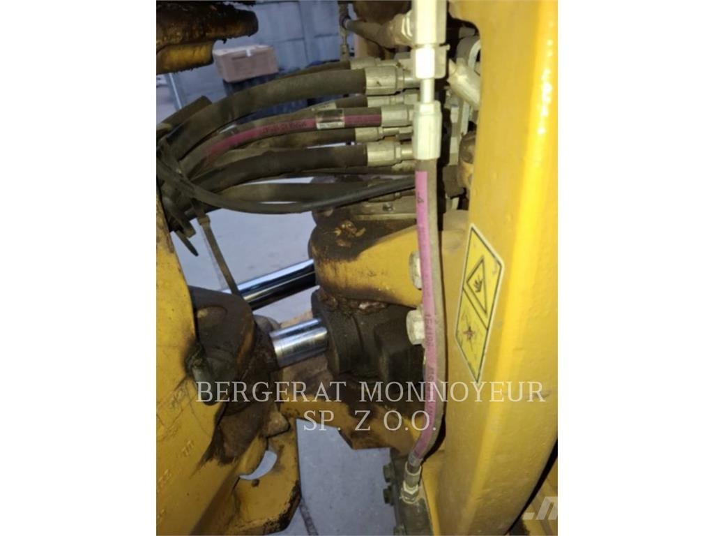 CAT 428-07 Екскаватори-навантажувачі