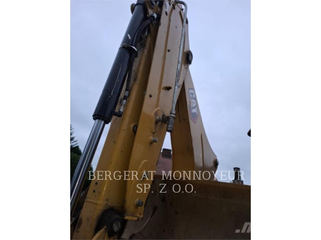 CAT 428-07 Екскаватори-навантажувачі