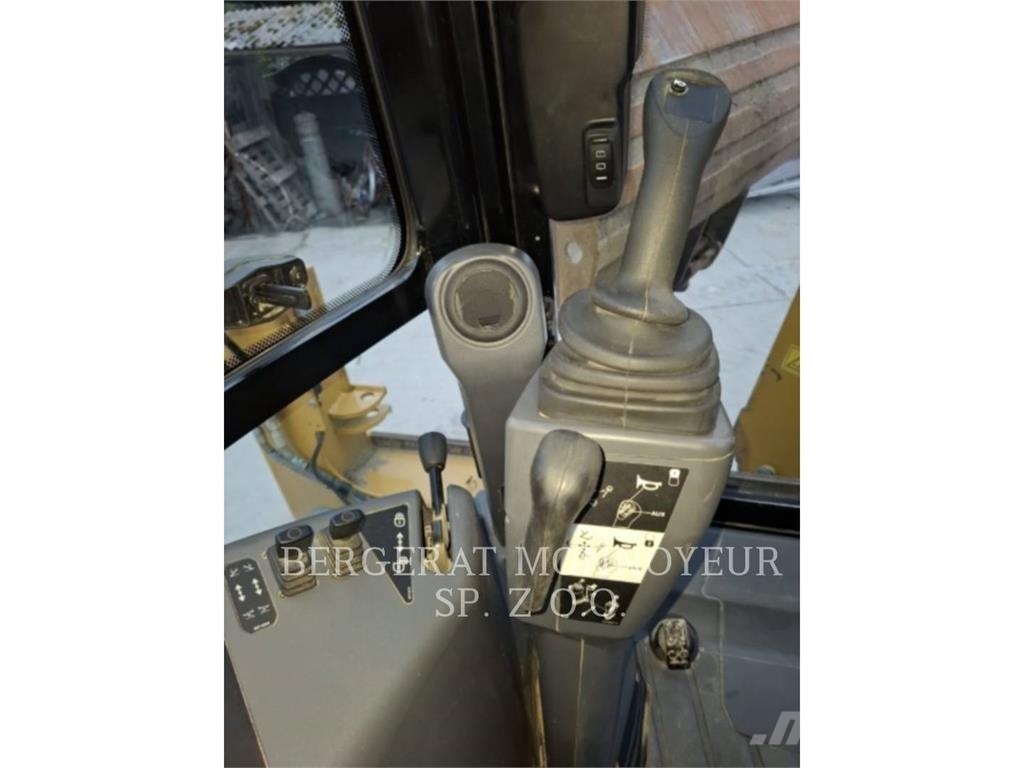 CAT 428-07 Екскаватори-навантажувачі
