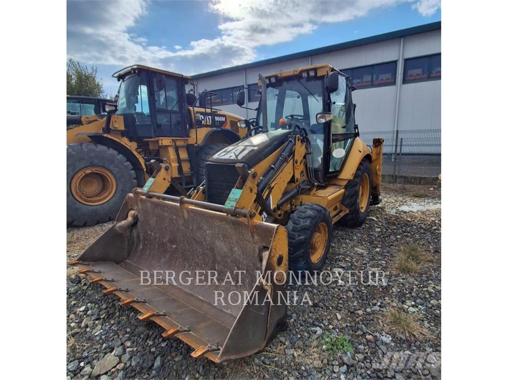CAT 428E لوادر ذات جرافات عكسية