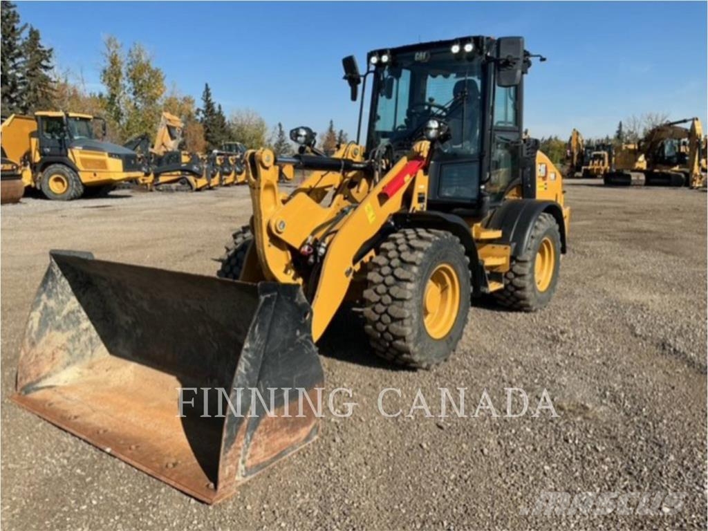CAT 908-14 لوادر بعجل