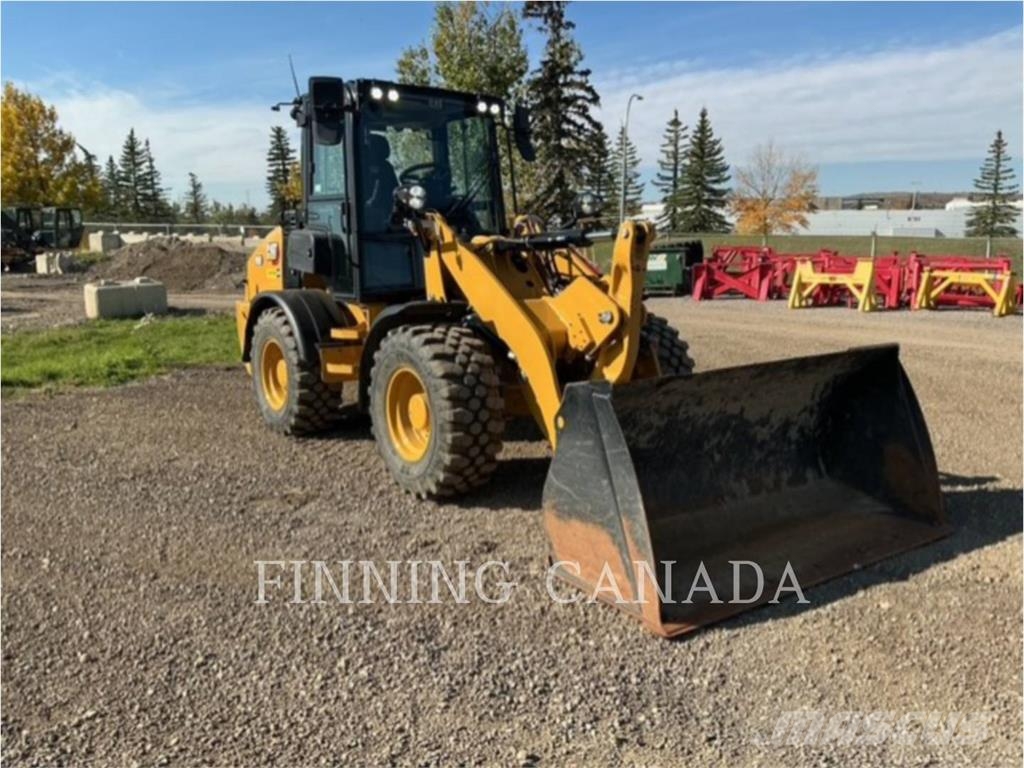 CAT 908-14 لوادر بعجل