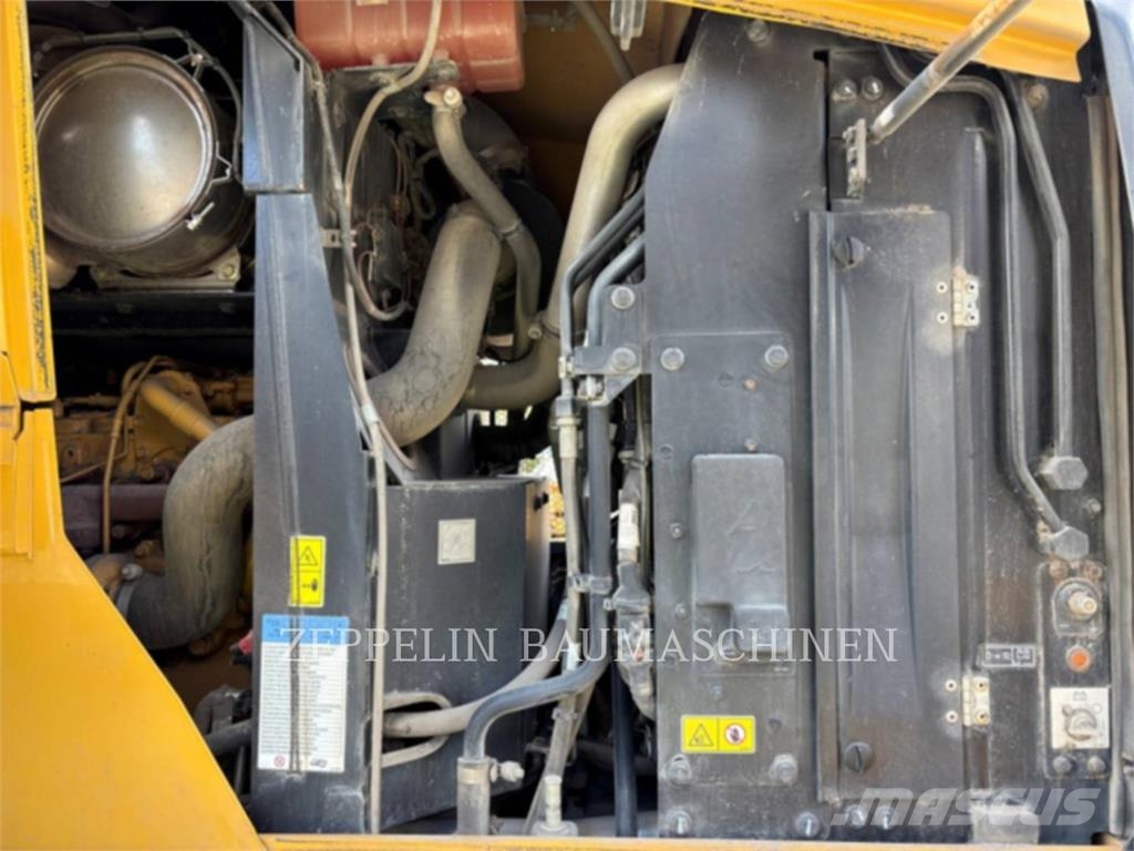 CAT 938M Iekrāvēji uz riteņiem