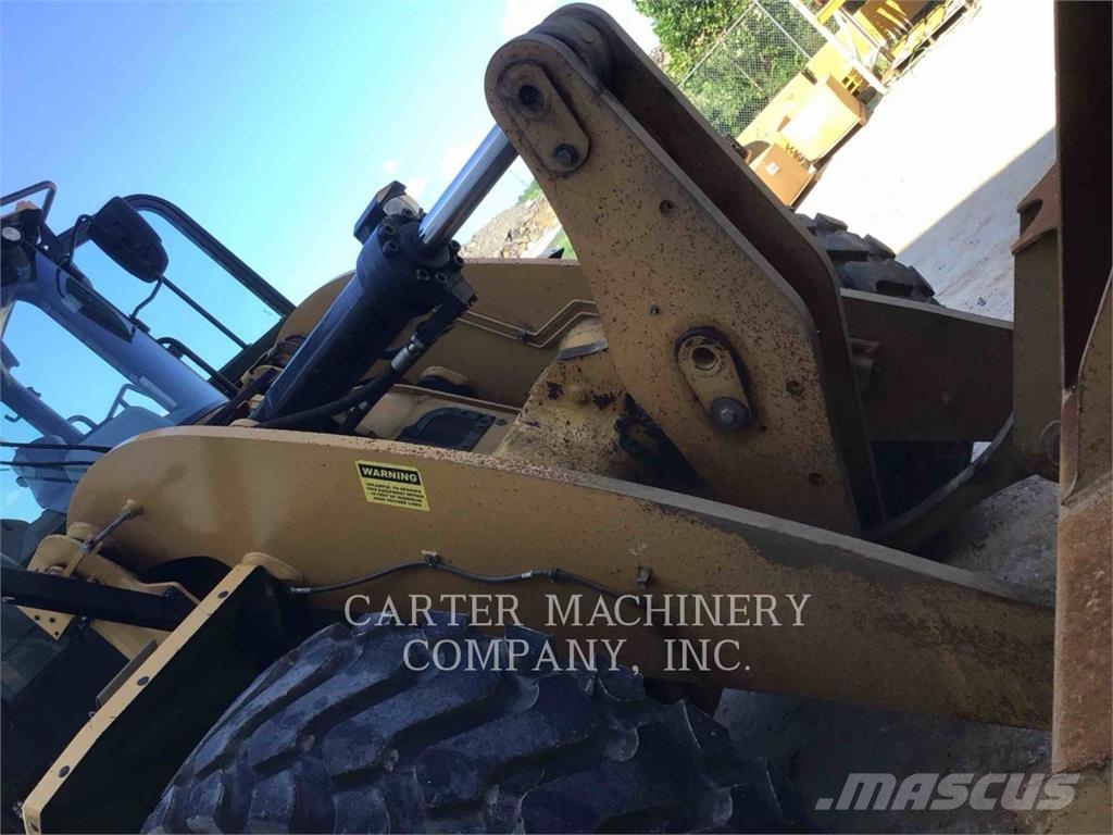 CAT 950-14 لوادر بعجل