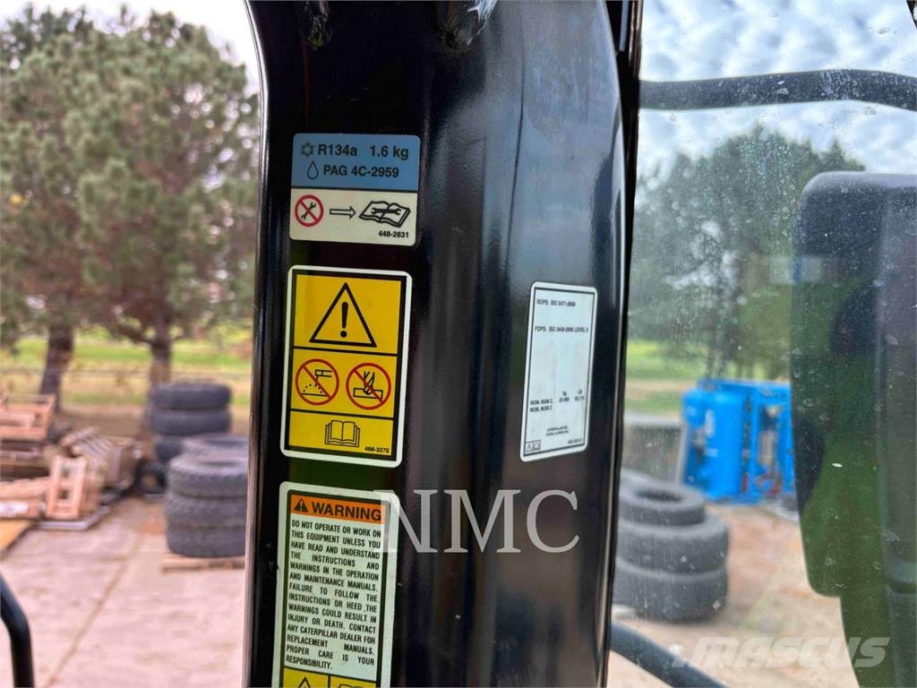 CAT 950M Pale gommate