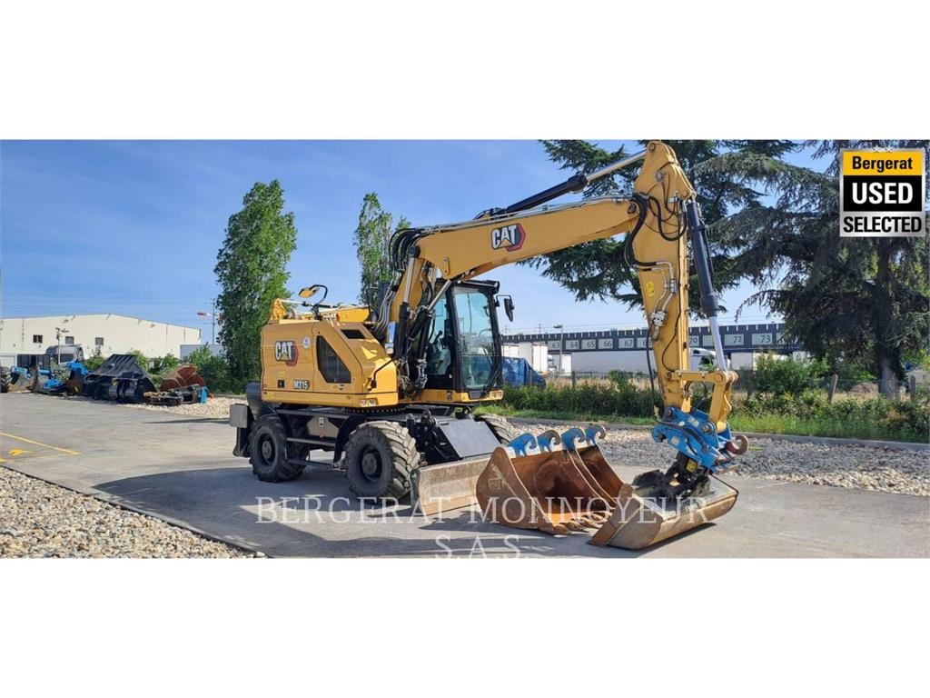 CAT M315 Pelle sur pneus