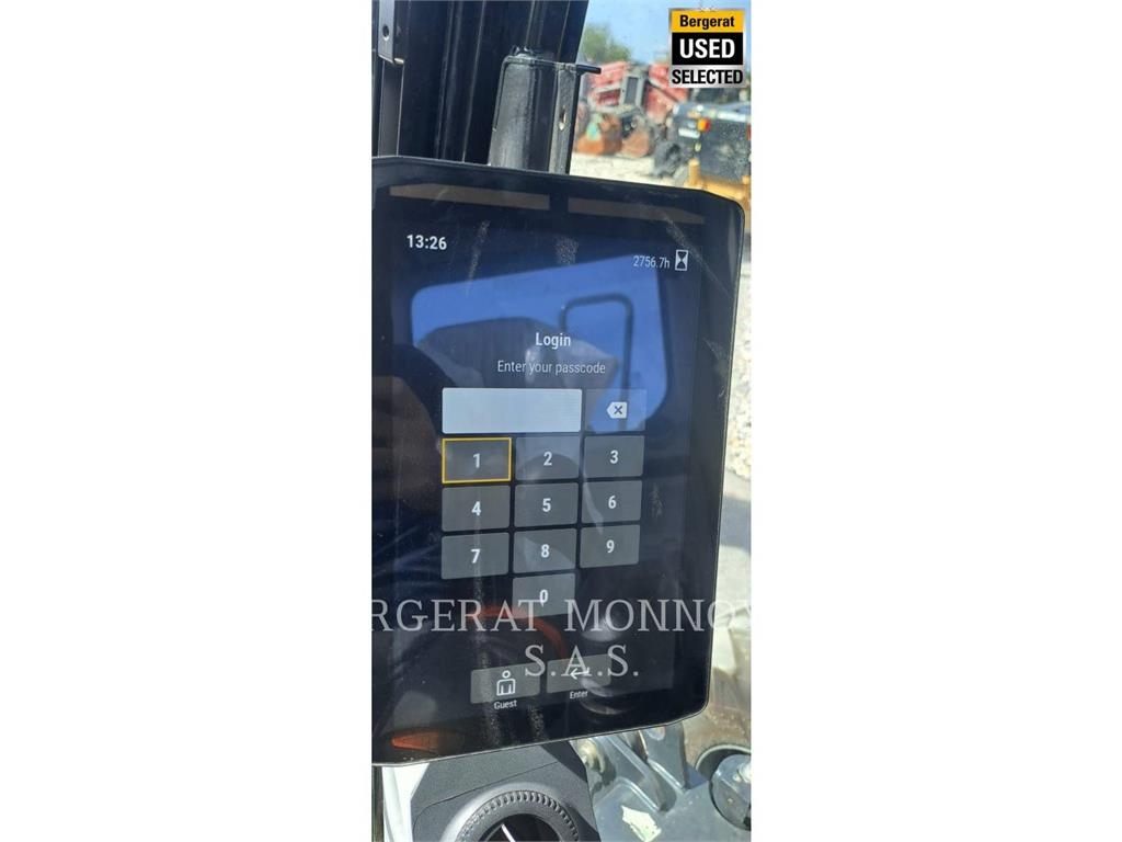 CAT M315 Pelle sur pneus