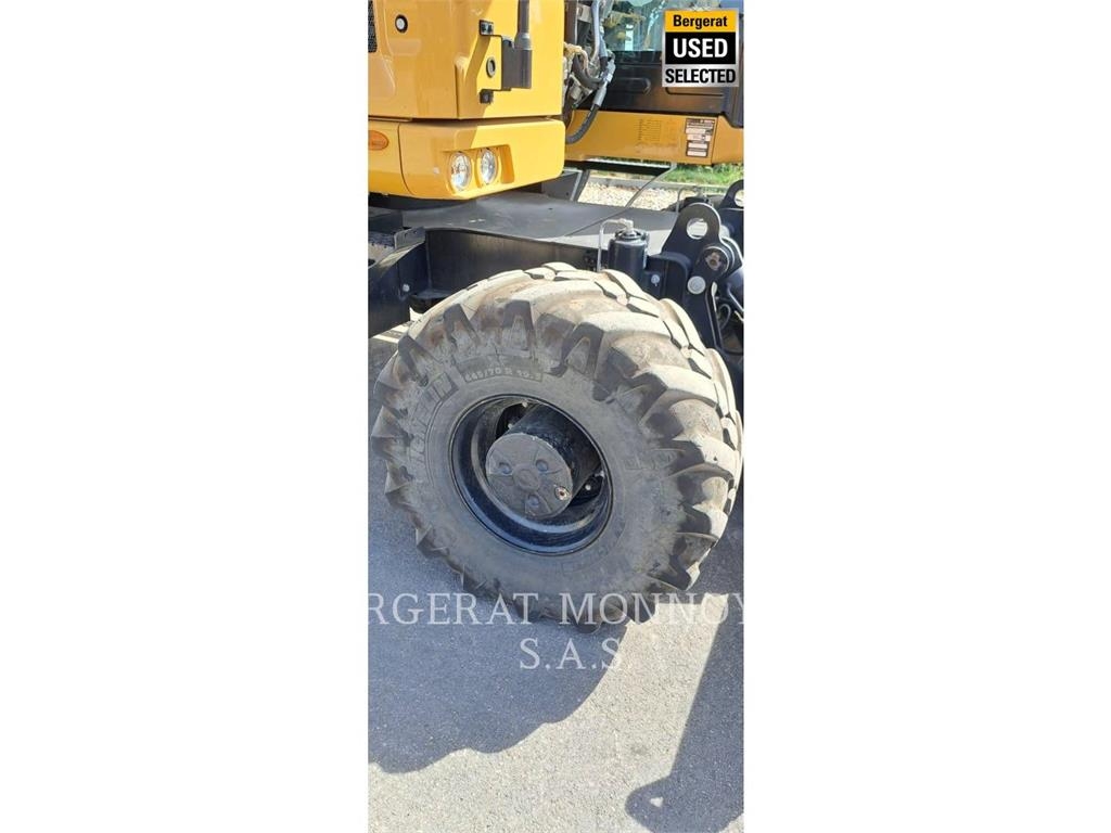 CAT M315 Pelle sur pneus