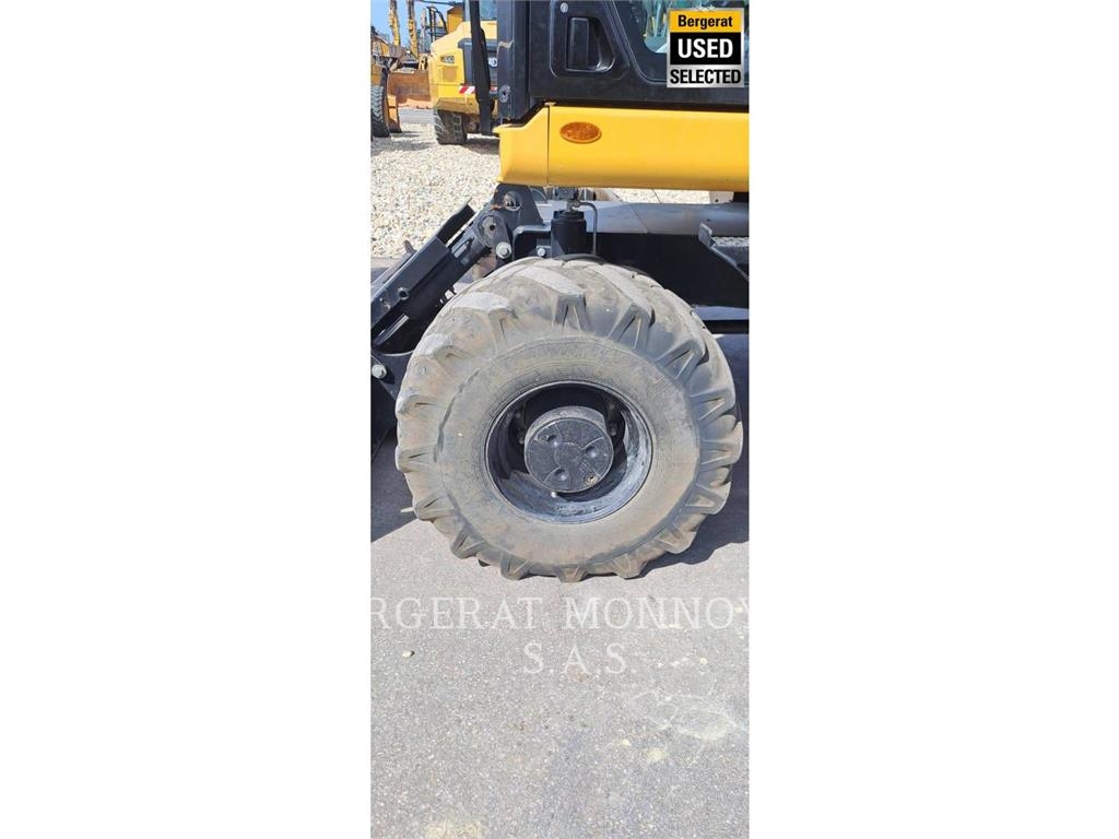 CAT M315 Pelle sur pneus