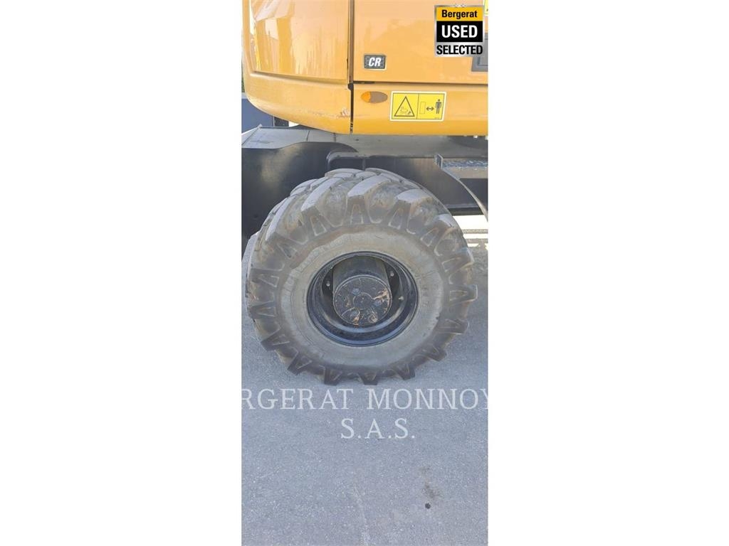 CAT M315 Pelle sur pneus