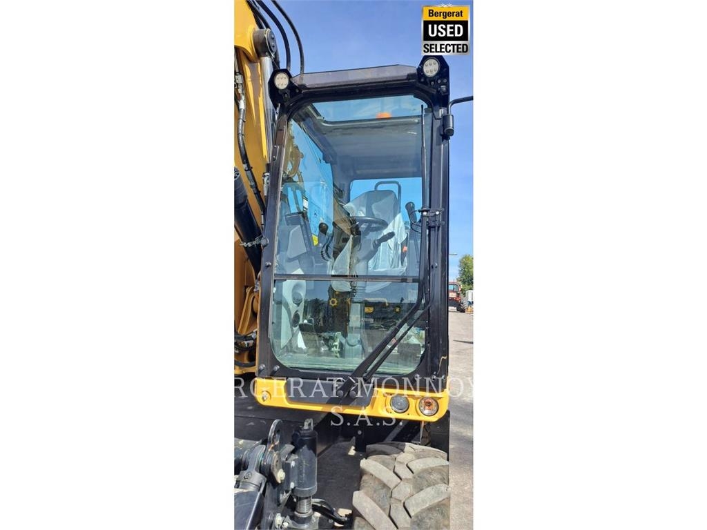 CAT M315 Pelle sur pneus