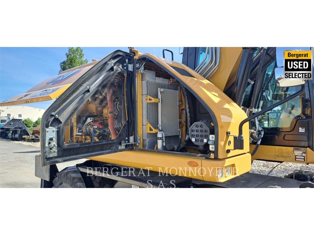 CAT M315 Pelle sur pneus