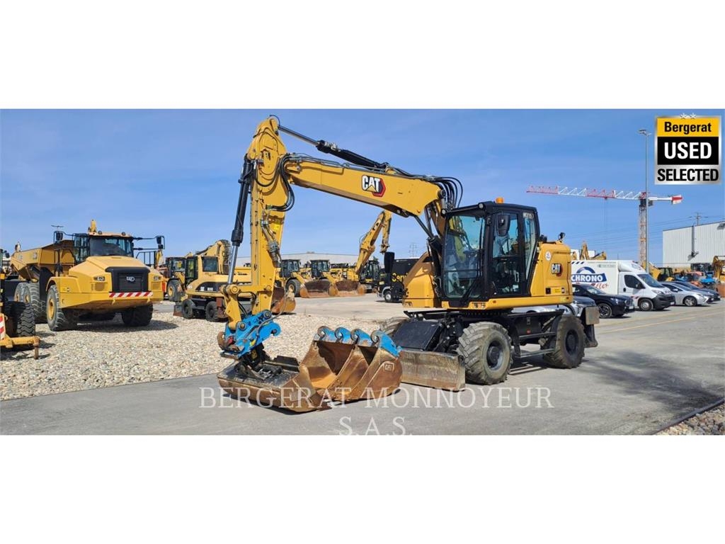 CAT M315 Pelle sur pneus