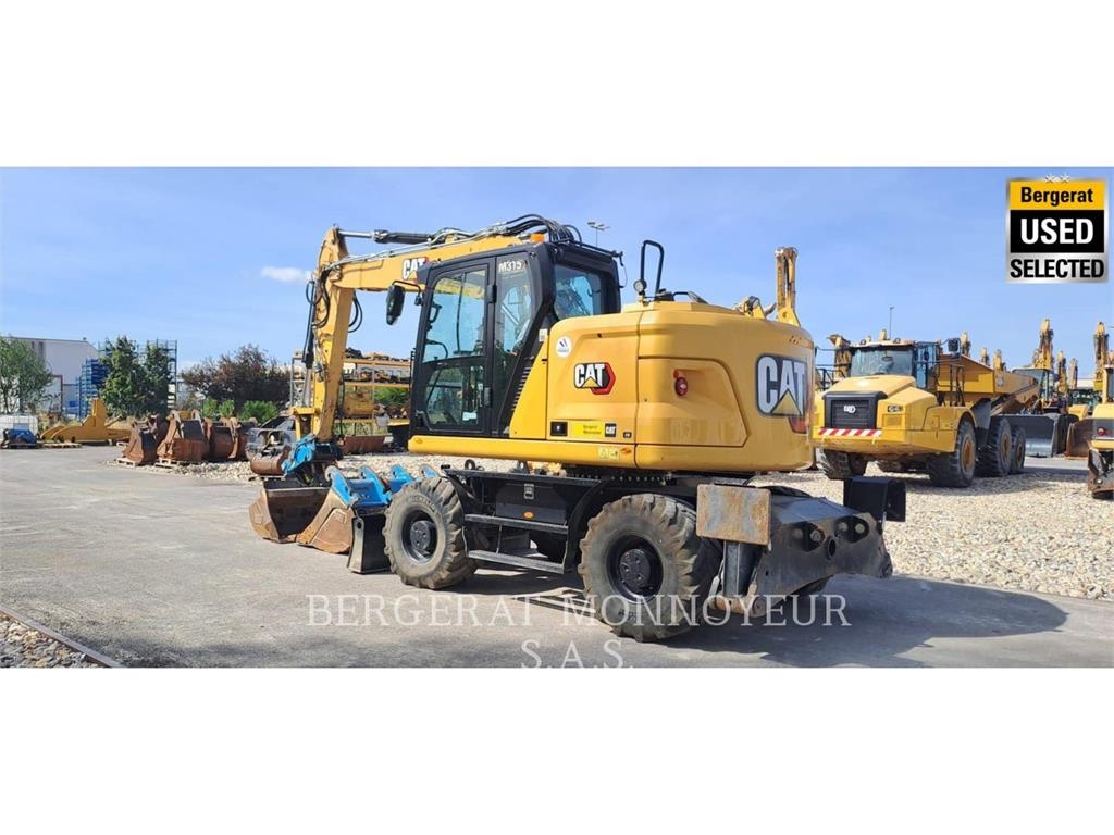 CAT M315 Pelle sur pneus
