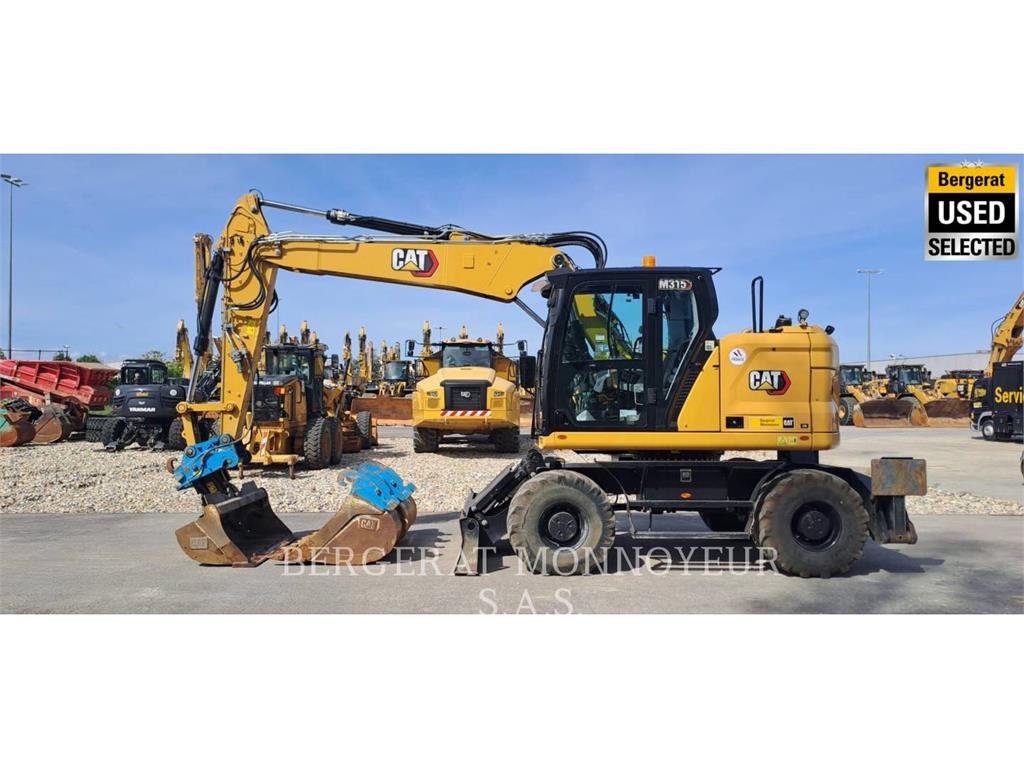 CAT M315 Pelle sur pneus