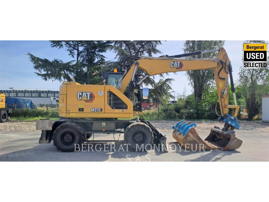 CAT M315 Pelle sur pneus