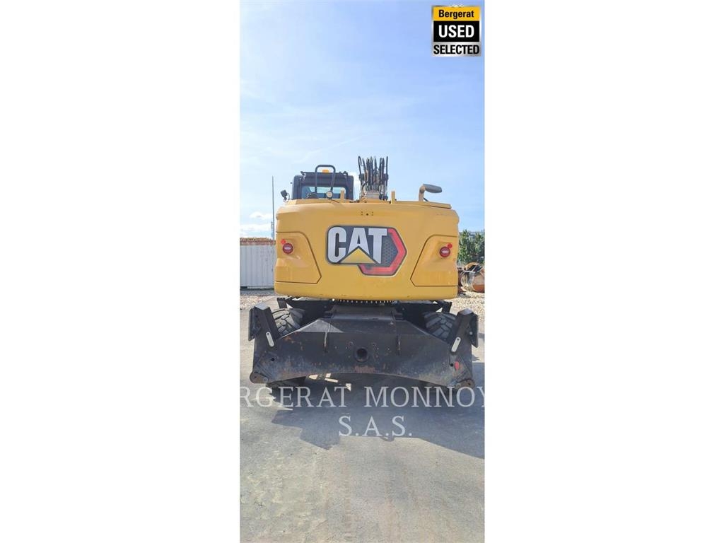 CAT M315 Pelle sur pneus
