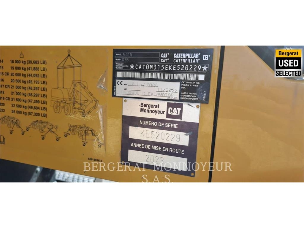 CAT M315 Pelle sur pneus