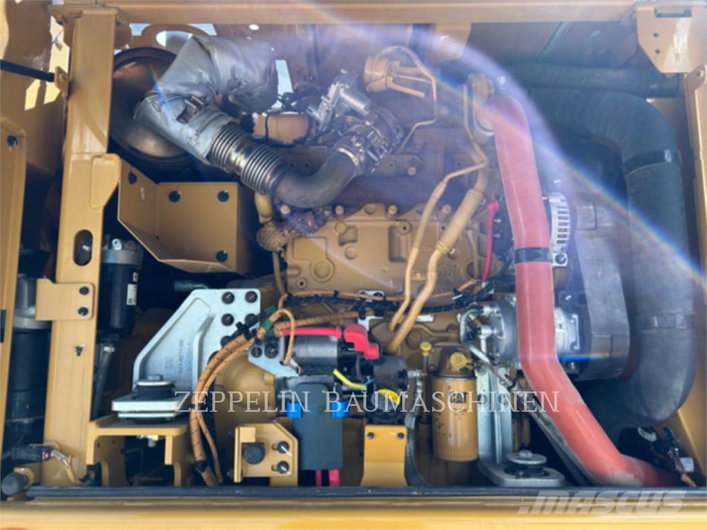 CAT M315-07A حفارات بعجل