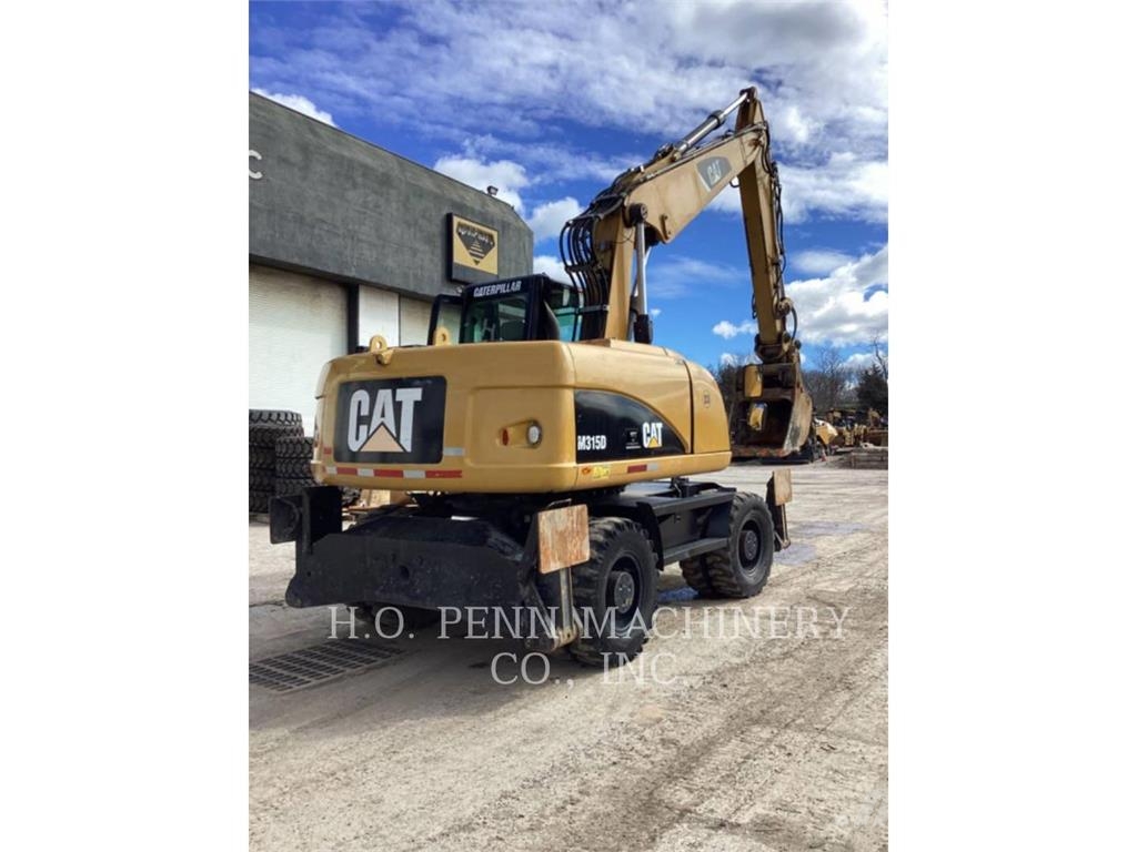 CAT M315D 휠 굴삭기