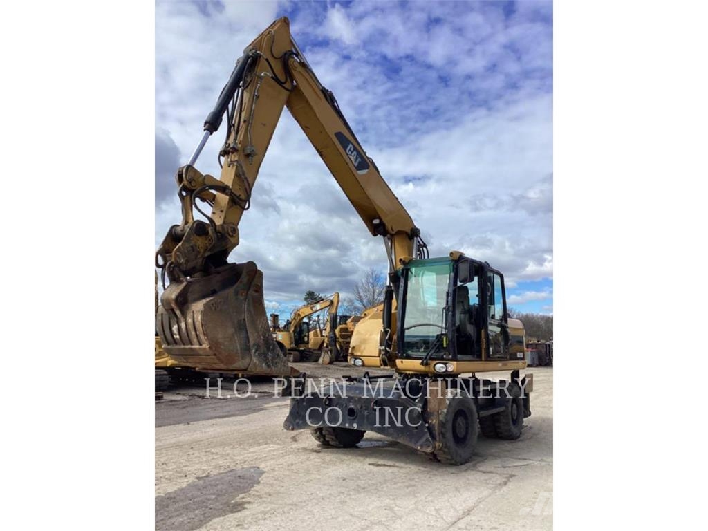 CAT M315D 휠 굴삭기