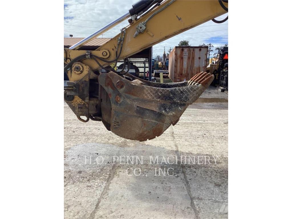 CAT M315D 휠 굴삭기