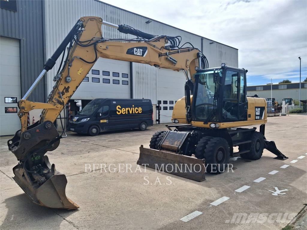 CAT M316D Pelle sur pneus