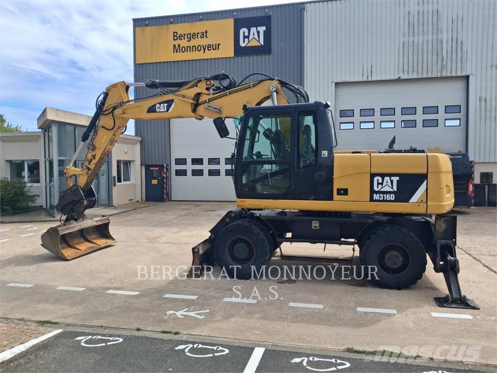 CAT M316D Pelle sur pneus