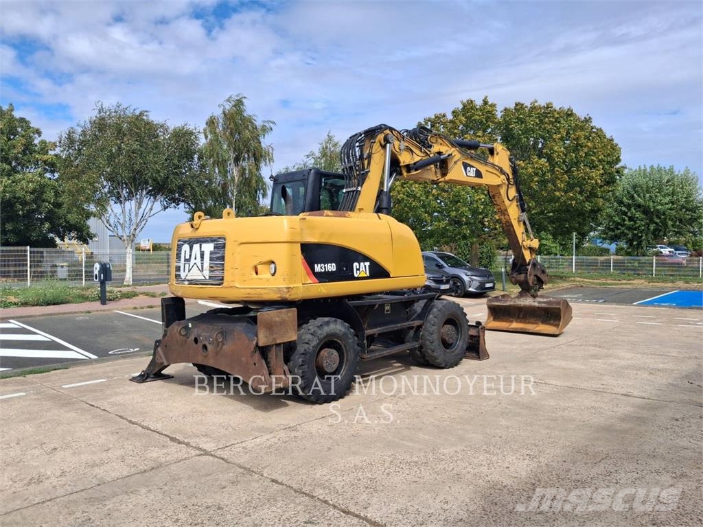 CAT M316D Pelle sur pneus