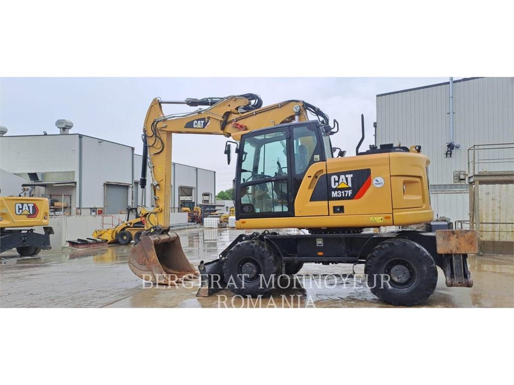 CAT M317F Wielgraafmachines