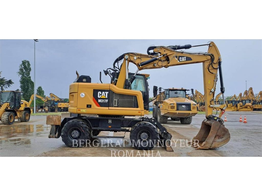 CAT M317F Wielgraafmachines