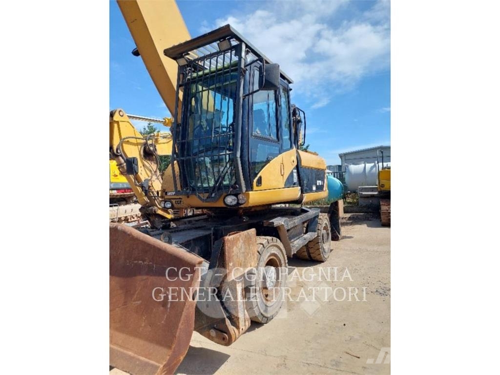 CAT M318D MH Колесни екскаватори