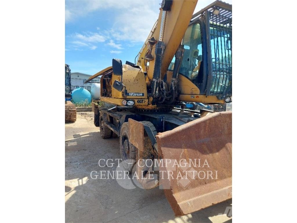 CAT M318D MH Колесни екскаватори