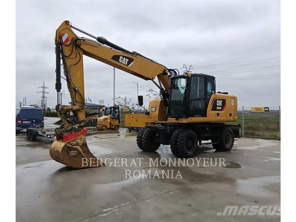 CAT M318F Pelle sur pneus