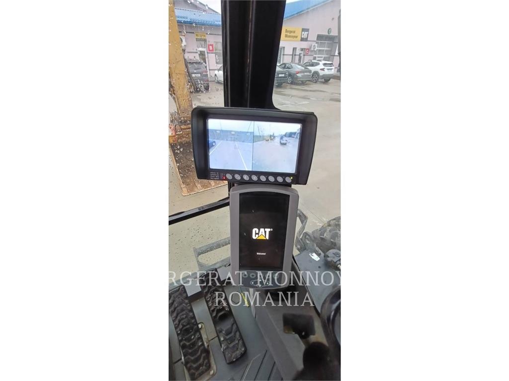 CAT M318F Pelle sur pneus