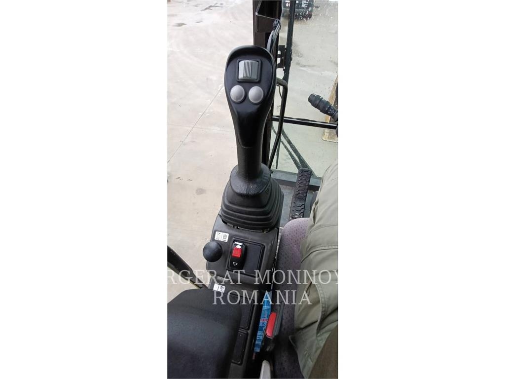 CAT M318F Pelle sur pneus
