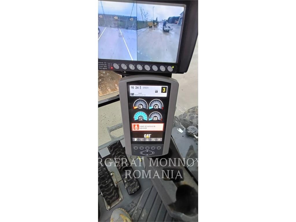 CAT M318F Pelle sur pneus