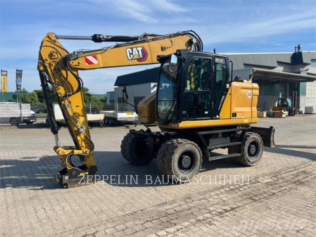CAT M319-07A Bagri na kolesih