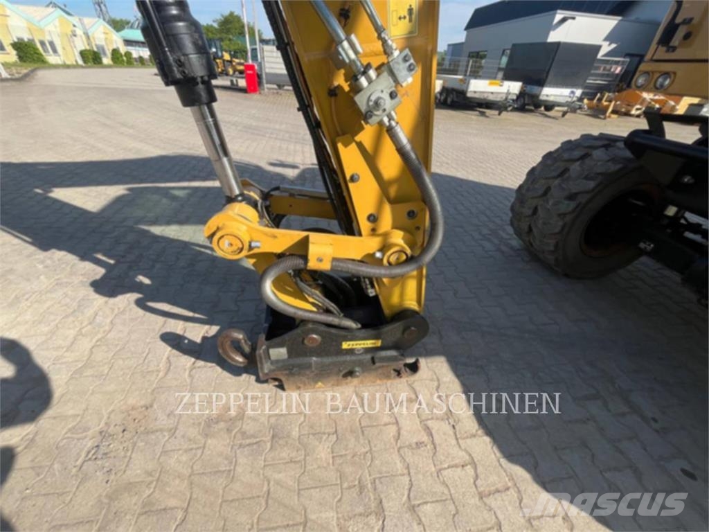CAT M319-07A Bagri na kolesih