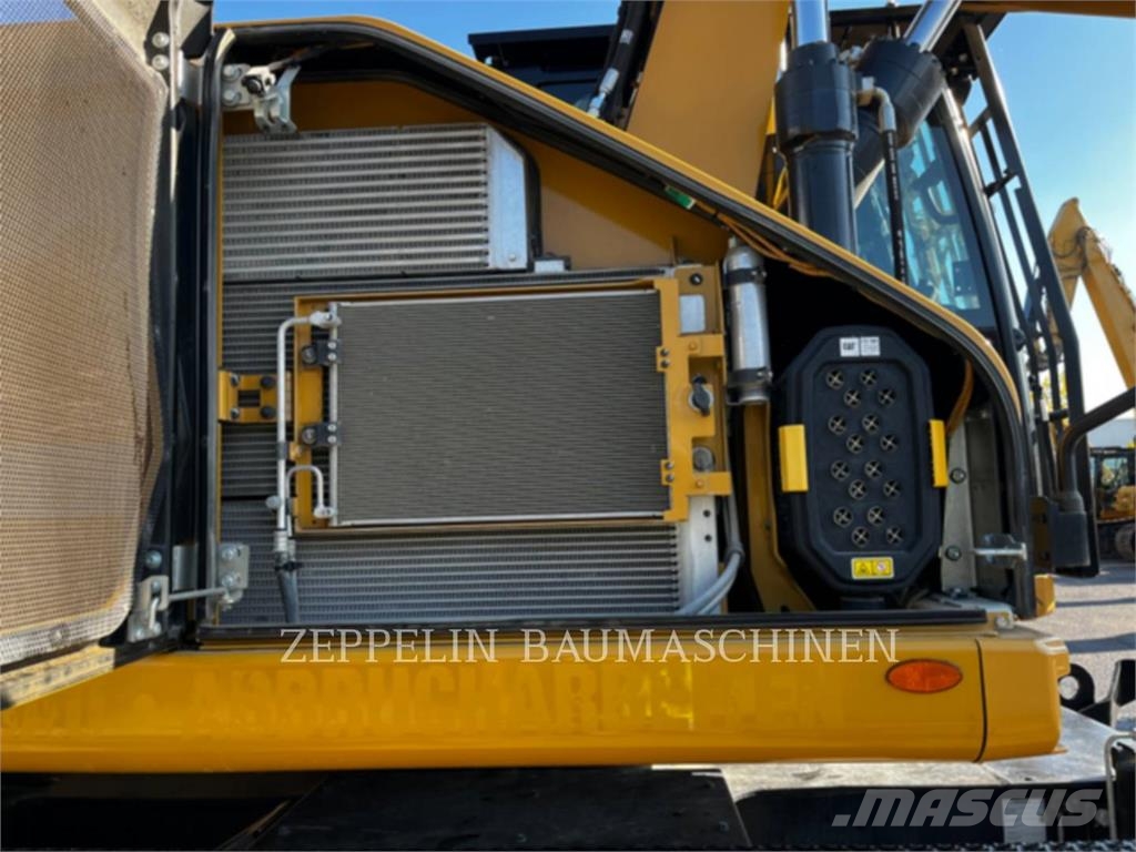 CAT M320-07A Ekskavatori uz riteņiem