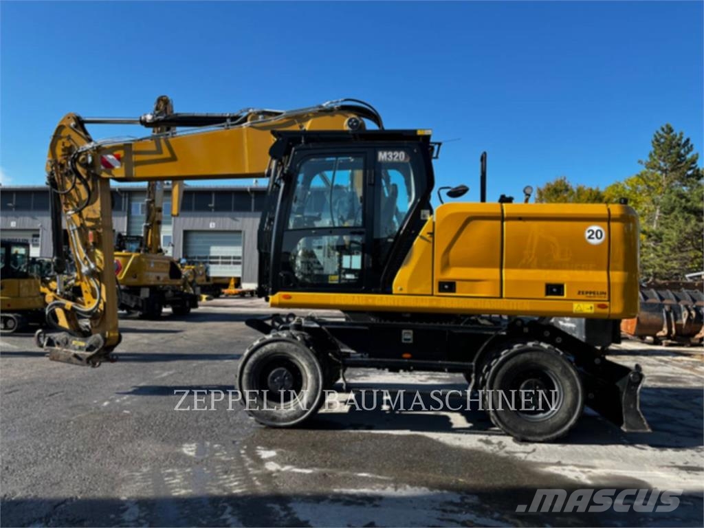 CAT M320-07A Ekskavatori uz riteņiem