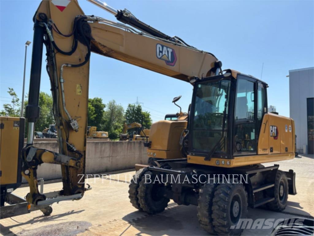 CAT M320F Gumikerekes kotrók